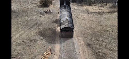 Aerial view of class 5 gravel spread across a driveway