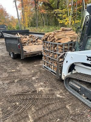 Skid steer loading firewood